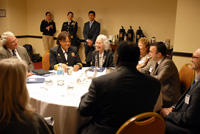 From Left to Right, seated, Mayor Dennis Donohue, Salinas, The Honorable Vice Admiral Regina M. Benjamin, U.S. Surgeon General; Barbara Ferrer, Executive Director, Boston Public Health Commission, and other Forum attendees meet to discuss their youth violence prevention efforts.